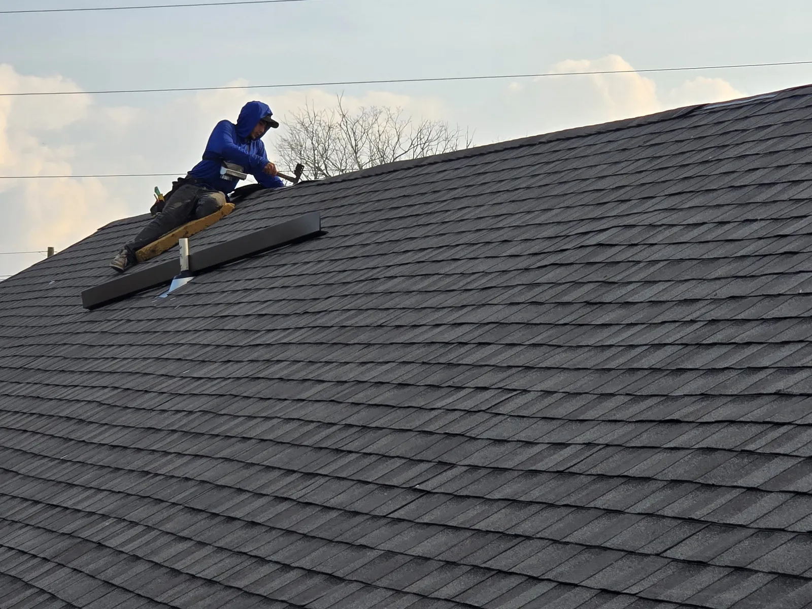 Asphalt shingle roof installation completed by Momiko
