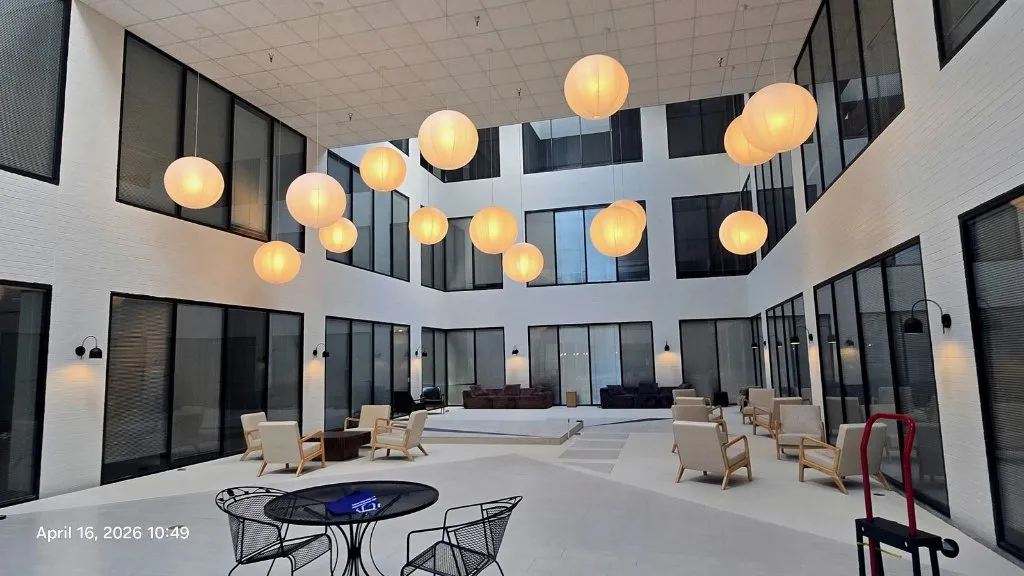 Finished commercial atrium with seating and lighting